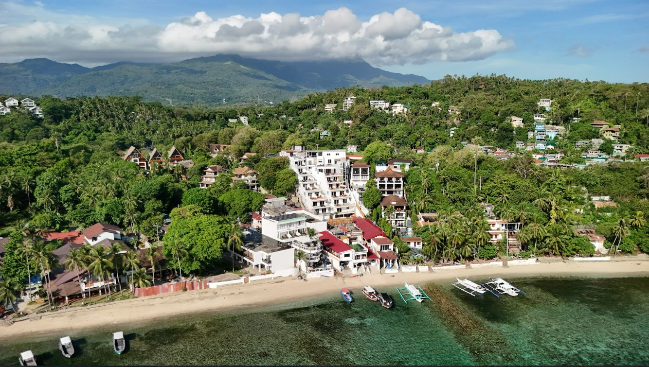 Eye-level view from the pool overlooking the bay at Lalaguna Villas